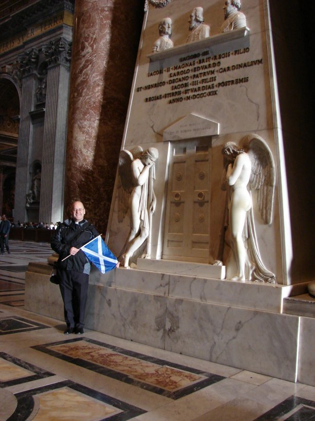 Mgr John being patriotic at the Stuart Monument in St Peter’s.